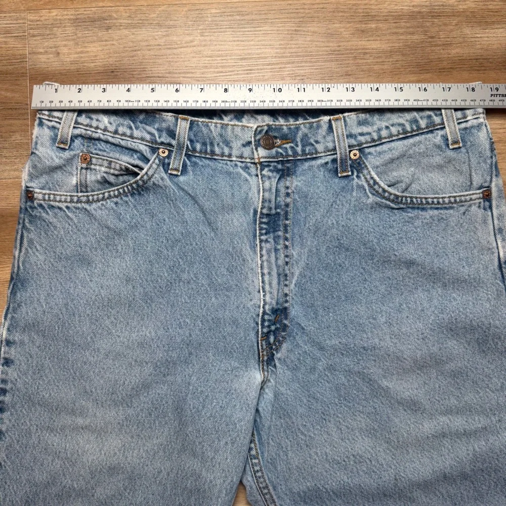 Vintage Levi's 550 Relaxed Fit Jeans Men 38x32 Light Wash Orange Tab Denim 1997